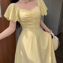 guangzhougaolangshangmao  Vestido elegante y romántico de manga corta, cintura recogida y plisado en A, de longitud media, en color amarillo tejido, para primavera/verano - Amarillo - Ver 7