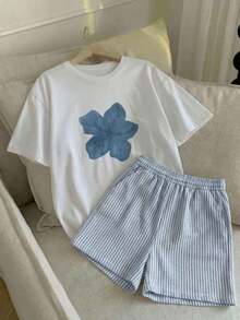 Almacén local, una camiseta de manga corta para mujer con estilo retro americano, de corte holgado y diseño estampado (los pantalones son solo para sugerencias de estilo). Esta pieza sencilla y elegante presenta un patrón de letras impresas con temática tropical, lo que la convierte en un elemento imprescindible para crear un look relajado de vacaciones, perfecto para ocasiones como el Día del Trabajo y el Día de la Independencia de México. - Blanco - Ver 1