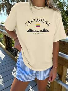 Blusa casual para mujer, camiseta de manga corta con cuello redondo, 100% algodón, lavable a máquina, fácil cuidado, diseño casual con estampado de letras, silueta de la ciudad de Cartagena y insignia de la bandera, nueva colección de verano 2026 para uso diario y viajes, camisas de algodón para mujer. - Albaricoque - Ver 1