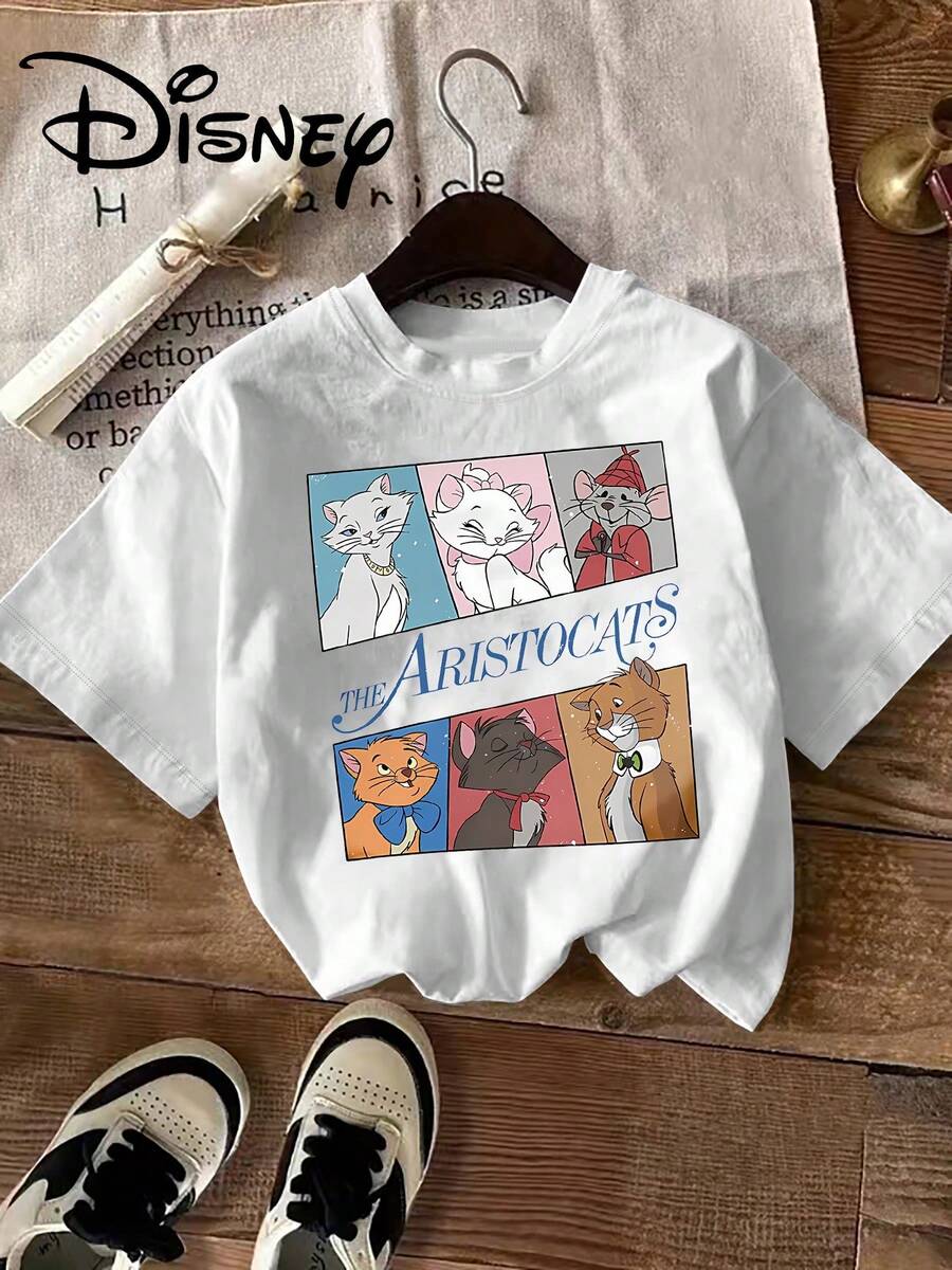 Disney T-shirt à manches courtes et col rond imprimé Minnie Mouse, orné de strass et d'un nœud papillon. Un modèle tendance et adorable. Confortable, élégant et polyvalent, idéal pour le printemps, l'été et l'automne. Un design optimiste et un tissu extensible. - Blanc - Voir 1