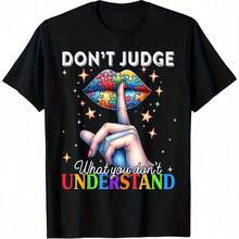 Una camiseta con las llamativas palabras "No juzgues" y coloridos gráficos de concientización sobre el autismo, con un diseño impactante que incluye rompecabezas táctiles (con esmalte de uñas de colores) y el texto fluido "Lo que no debes hacer", así como las vibrantes letras "Entender", perfecta para defensores que buscan un atuendo cómodo de una sola pieza. Camiseta Algodón - Negro - Ver 1