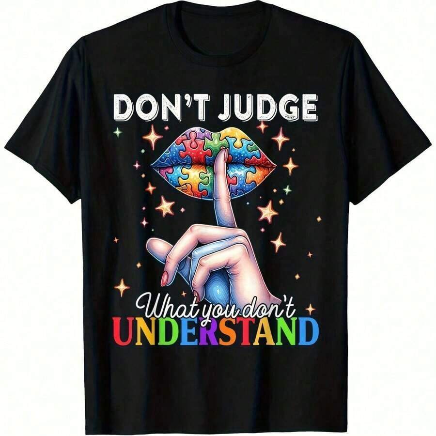 Una camiseta con las llamativas palabras "No juzgues" y coloridos gráficos de concientización sobre el autismo, con un diseño impactante que incluye rompecabezas táctiles (con esmalte de uñas de colores) y el texto fluido "Lo que no debes hacer", así como las vibrantes letras "Entender", perfecta para defensores que buscan un atuendo cómodo de una sola pieza. Camiseta Algodón - Negro - Ver 1