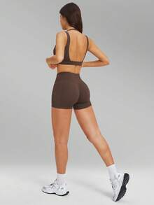 Bộ đồ tập yoga màu nude MFVIM dành cho nữ, kiểu dáng ôm sát, hở lưng, đa năng, gồm áo ngực thể thao và quần short. Chất liệu mềm mại, thân thiện với da, phù hợp cho đi làm, hoạt động ngoài trời, chạy bộ, đạp xe, yoga và tập thể dục. - Cà phê nâu - Xem 9