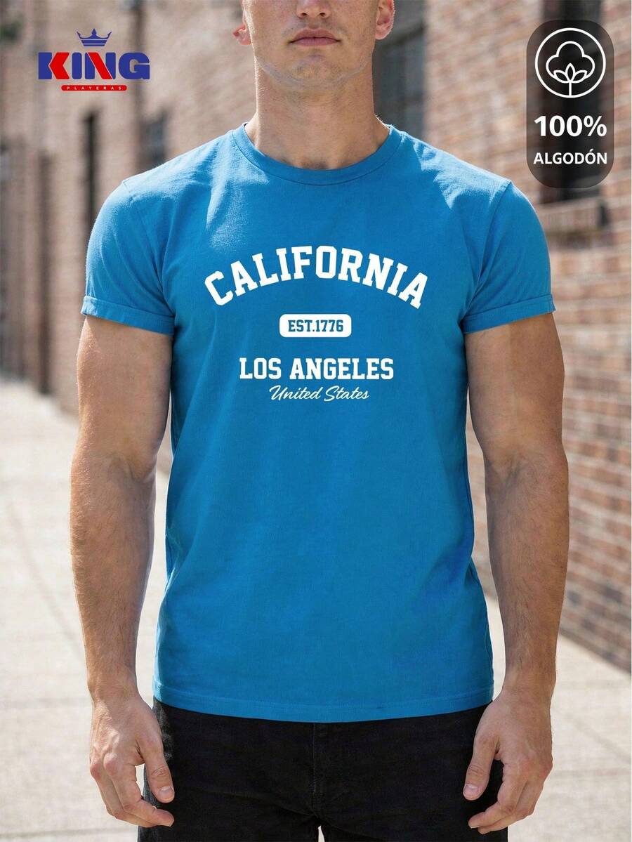 King T-shirt Playera 100% algodón de excelente calidad, esta playera garantiza una suavidad excepcional al tacto, cuello redondo con estampado "California Los Angeles Varsity" y manga corta - Neblina azul - Ver 1