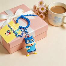 MINISO Crayon Shin-Chan Cartoon Keychain With Playful Expressions, Ideal For Backpack, Handbag, Or Key Decoration, Fun Collectible Accessory, Vibrant And Durable Design, Multiple Styles Available - Red - View 4