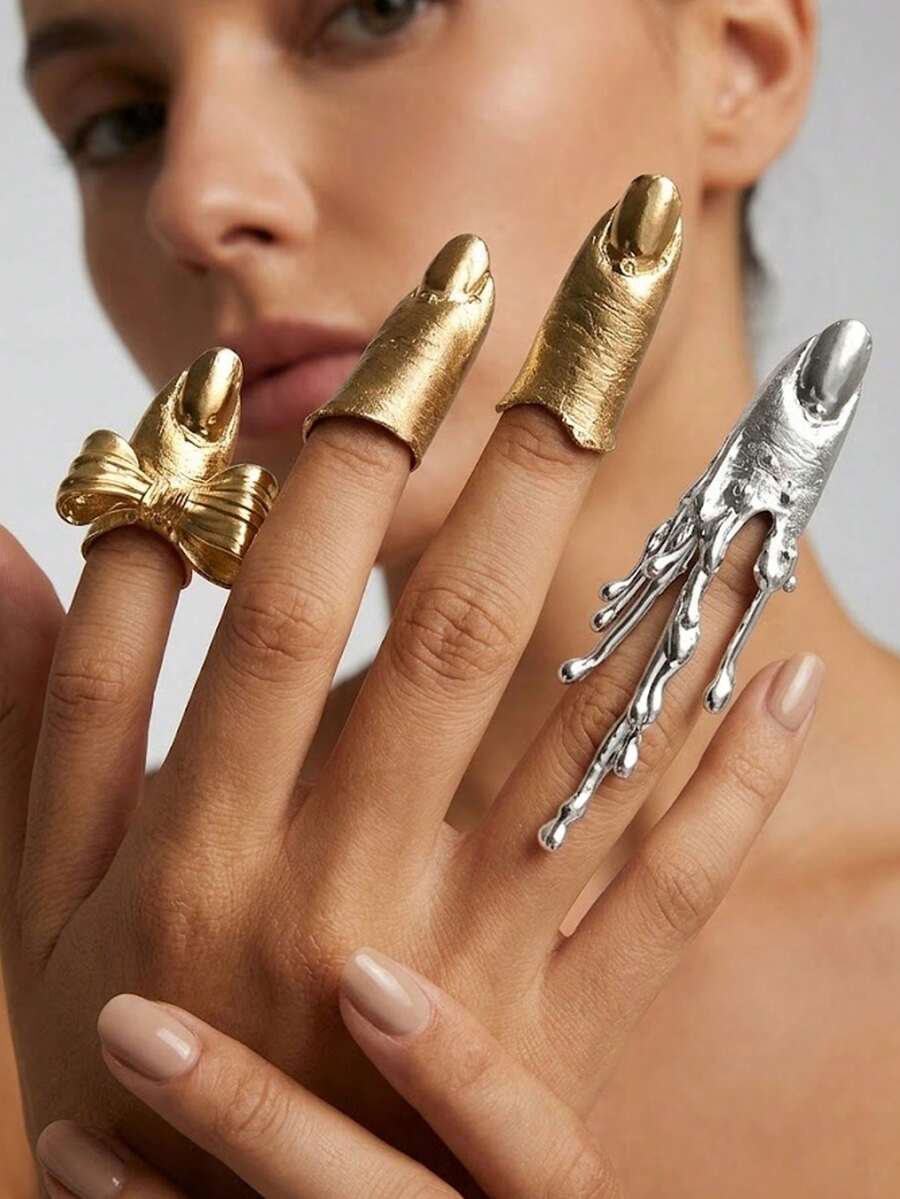 4 piezas Conjunto de anillos góticos y punk para mujeres - Armadura de dedos y anillos de puntas de estilo audaz | Diseños de gotas líquidas de plata fundida y lazos dorados | Joyería de moda ajustable y apilable | Regalo para cosplay, fiestas y eventos especiales