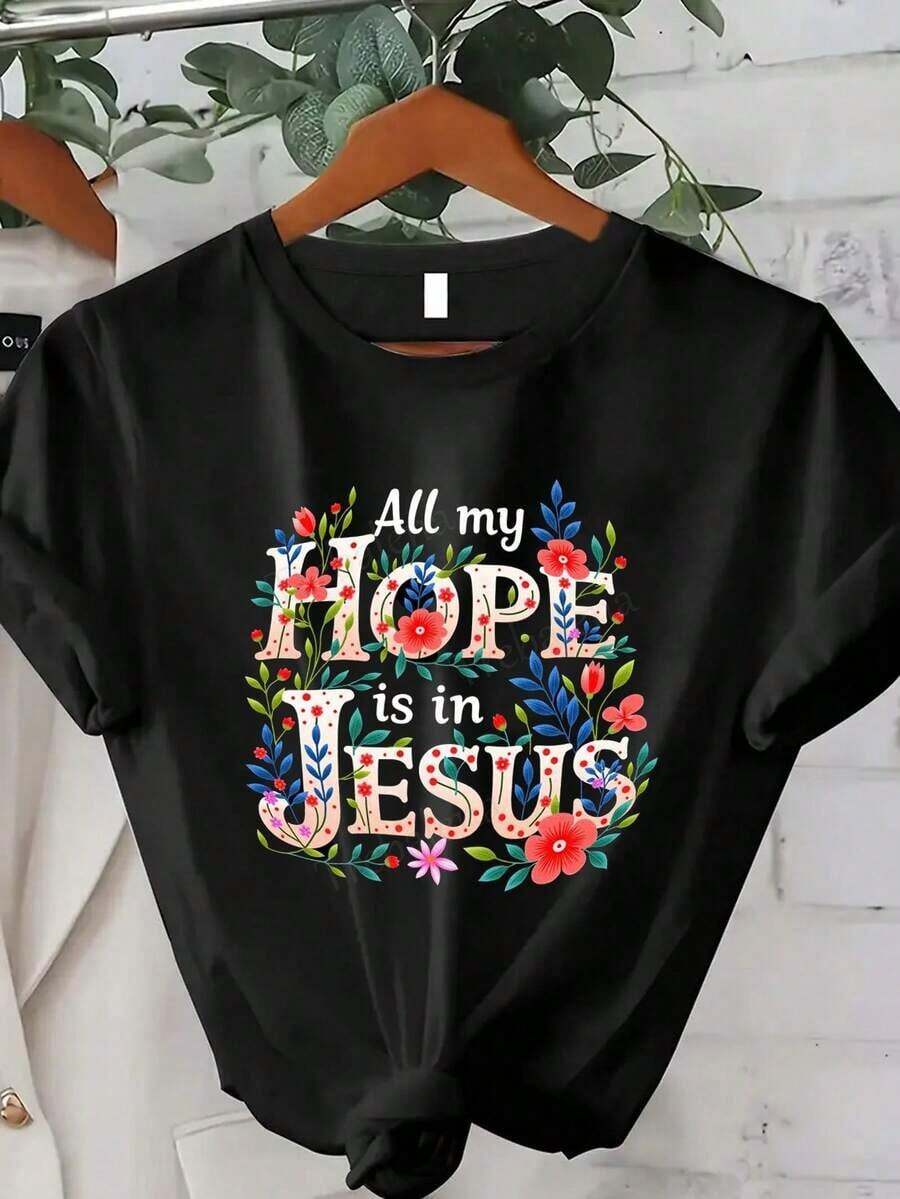 Camiseta de Mujer Oversized "Toda Mi Esperanza Está En Jesús" con Estampado Floral de Trebalena - Camiseta Gráfica Cristiana 100% Cómoda con Estampado Multicolor Vibrante, Cuello Redondo Casual y Manga Corta para Iglesia, Ropa Casual y Conjuntos de Verano. - Negro 2 - Ver 1