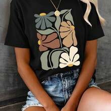 Camiseta con estampado gráfico, top casual de manga corta y cuello redondo para verano y primavera, ropa de mujer - Negro - Ver 1