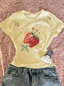 Camiseta de mujer de cuello redondo holgada de manga corta, con estampado de lazo de fresa pintado a mano en estilo retro americano dulce, adecuada para picnic de primavera, campus diario, citas, salidas casuales, mercado retro y otras ocasiones de verano - Amarillo 2 - Ver 1
