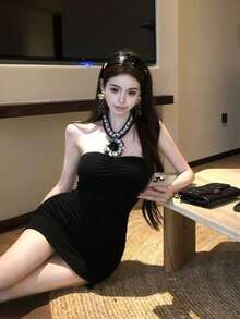 An Elegant And Sophisticated Halter-Neck Women's Dress With An Open Back. Perfect For Summer. The Slim Silhouette Offers Excellent Figure-Flattering Effects. An Ideal Dress For Summer. - Black - View 4