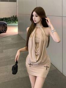 An Elegant And Sophisticated Halter-Neck Women's Dress With An Open Back. Perfect For Summer. The Slim Silhouette Offers Excellent Figure-Flattering Effects. An Ideal Dress For Summer. - Apricot - View 2