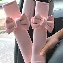 Un carino coprisedile con fiocco, copricintura per auto, e accessorio per l'interno dell'auto, adatto per donne e ragazze. - nero - Visualizzare 3