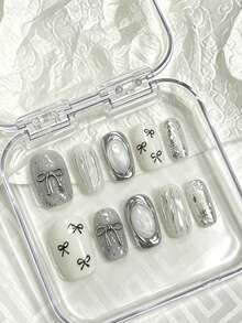10pcs Medium Gray Silver Bow Nail Stickers, Minimalist Elegant Style, Featuring Bow And Line Patterns, Using Nude Tie Dye And 3D Decorative Techniques, Suitable For Young And Mature Women, Applicable For Workplace, Formal Dates, And Refined Parties, Comes With Jelly Gel And Nail File - Silver - View 2