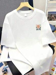 Camiseta de manga corta de moda primavera-verano 2026, hecha en México. Adopta un diseño de patrón floral, fácil de combinar con todo tipo de atuendos primaverales y se adapta a todas las formas del cuerpo. Ideal para citas, desplazamientos diarios y salidas informales. - Blanco - Ver 2