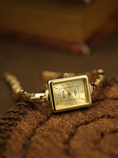 Este elegante reloj de pulsera presenta una esfera rectangular y está diseñado para mujeres. Es un reloj sofisticado y elegante, perfecto para ir al trabajo o para el uso diario. Su diseño inspirado en el vintage lo convierte en un regalo ideal.