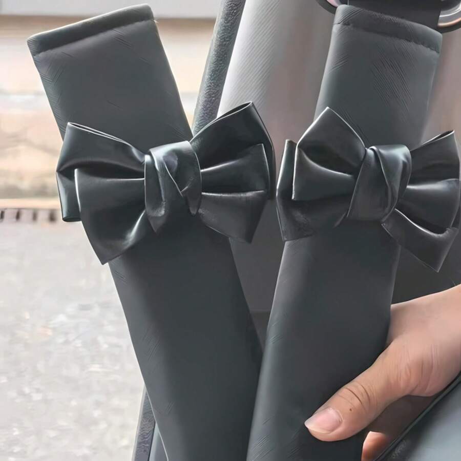 Un carino coprisedile con fiocco, copricintura per auto, e accessorio per l'interno dell'auto, adatto per donne e ragazze. - nero - Visualizzare 1