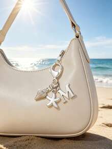 Chaveiro Boho Prateado com Inicial, Concha e Estrela-do-Mar, Chaveiro Personalizado com Letras de A a Z, Pingente para Bolsa com Estética de Férias na Praia, Joia Costeira para Bolsa, Mochila, Carteira e Chaves do Carro. Acessório Boho de Verão para Mulheres, Meninas e Amantes da Praia. Perfeito para Viagens, Férias, Uso Diário e Looks de Resort, Presente Ideal para o Verão de 2026, Aniversário, Formatura, Dia dos Namorados e Presentes de Amizade. - Multicolorido - Ver 6
