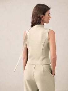 AYYBizChic Chaleco con cuello en V, recorte de encaje, parche delantero con botones y lazo en la cintura para mujeres, versátil para la oficina, ocasiones formales, elegante para el transporte urbano, uso casual diario, retro romántico de los 90, fiestas, graduaciones, invitados de boda, damas de honor, anfitrionas, salidas, eventos sociales, conciertos, brunches, aeropuertosAYY - Albaricoque - Ver 2