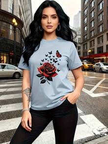 The Rose, Symbolizing Love And Beauty, And The Butterfly, Representing Transformation And Freedom, Are Printed On This Modern And Stylish Women's T-Shirt. It Features A Simple Crew Neck, Casual And Versatile Short Sleeves, And Is Suitable For Leisure, Travel, Vacations, And Other Activities. 10806 LVOB - 淺藍色 - 查看 1