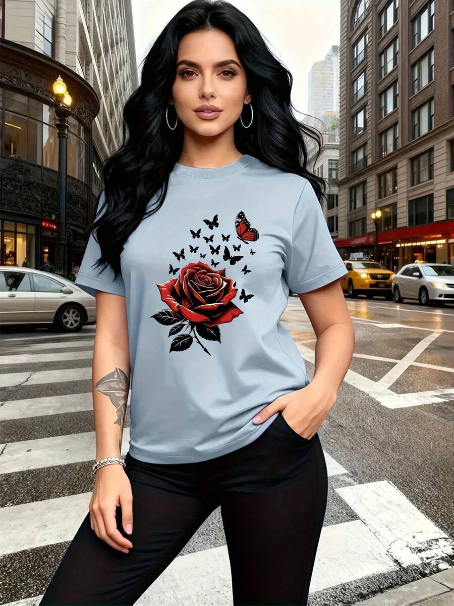 The Rose, Symbolizing Love And Beauty, And The Butterfly, Representing Transformation And Freedom, Are Printed On This Modern And Stylish Women's T-Shirt. It Features A Simple Crew Neck, Casual And Versatile Short Sleeves, And Is Suitable For Leisure, Travel, Vacations, And Other Activities. 10806 LVOB - 淺藍色 - 查看 1