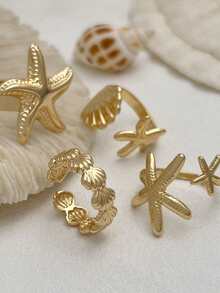 Set de 4 anillos apilables con estrella de mar y concha de estilo playero dorados, ajustables para adolescentes, joyería de verano con temática oceánica - Dorado - Ver 3