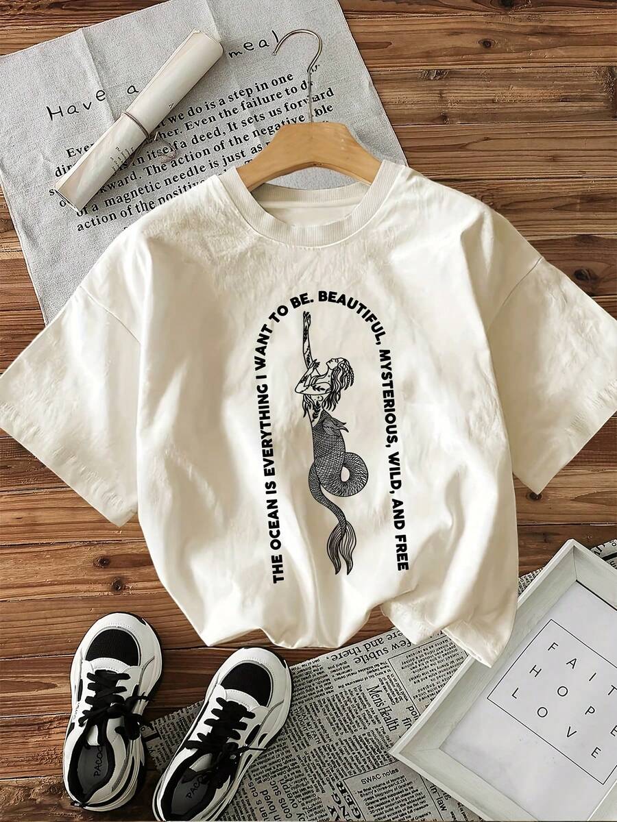 % Cotton [Nature Orientation] T-Shirt With 'Be Beautiful' Letter Print And Island Summer Fantasy Mermaid Tattoo Design, Casual Loose Round Neck Top For Women, Suitable For All Seasons, Can Be Worn As A Base Layer In Spring And Autumn Or By Itself In Summer, Unisex Style,  Thick Cotton Cityboy Style Top. - 杏色 - 查看 1