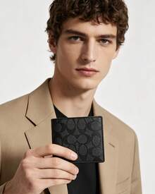 Coach Cartera plegable para identificación, de piel suave, delgada y minimalista, en lona con el logotipo de la marca, con seis ranuras para tarjetas de crédito. - Negro - Ver 4