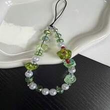 Cordón para teléfono con cuentas verdes frescas, estilo de curación suave de bosque, decorado con cuentas de vidrio con forma de corazón, estrella y flor, con un tono transparente y fresco que emana un ambiente de verano, acentuado con perlas falsas para mejorar la calidad. Se puede usar como correa para teléfono, llavero o accesorio para bolso, hecho a mano y duradero, diseño minimalista versátil adecuado para cualquier atuendo, práctico anti-pérdida para uso diario, adecuado como regalo o uso personal para crear una apariencia refrescante y limpia. - Verde Oliva - Ver 2