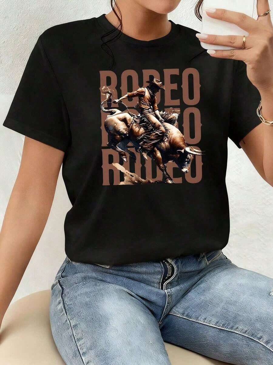 Art T-Shirt, The Pattern Shows A Brave Rider Taming A Raging Bull In A Rodeo Scene That Symbolizes Strength, Courage, Freedom And Adventurous Spirit In Full Dusty Action. Women's 100% Cotton T-Shirt, Comfortable And Durable, Ideal For An Authentic Casual Look Full Of Western Energy - 黑色 - 查看 1