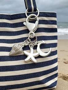 Chaveiro Boho Prateado com Inicial, Concha e Estrela-do-Mar, Chaveiro Personalizado com Letras de A a Z, Pingente para Bolsa com Estética de Férias na Praia, Joia Costeira para Bolsa, Mochila, Carteira e Chaves do Carro. Acessório Boho de Verão para Mulheres, Meninas e Amantes da Praia. Perfeito para Viagens, Férias, Uso Diário e Looks de Resort, Presente Ideal para o Verão de 2026, Aniversário, Formatura, Dia dos Namorados e Presentes de Amizade. - Multicolorido - Ver 9