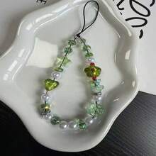 Cordón para teléfono con cuentas verdes frescas, estilo de curación suave de bosque, decorado con cuentas de vidrio con forma de corazón, estrella y flor, con un tono transparente y fresco que emana un ambiente de verano, acentuado con perlas falsas para mejorar la calidad. Se puede usar como correa para teléfono, llavero o accesorio para bolso, hecho a mano y duradero, diseño minimalista versátil adecuado para cualquier atuendo, práctico anti-pérdida para uso diario, adecuado como regalo o uso personal para crear una apariencia refrescante y limpia. - Verde Oliva - Ver 6