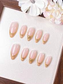 10 Pieces Of Handcrafted Almond-Shaped Nails With Golden Threads And French Pedicure Tips. The Features A Golden Bow Accessory. Simple, French-Style Design, Stylish And Luxurious Feel. Suitable For Daily Commuting And Social Gatherings. Quick-Release, Press-On False Nails. - Gold - View 12
