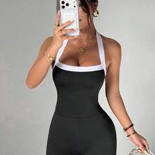 guangzhougaolangshangmao  Mono de yoga para mujer para exteriores y fitness, top de tirantes con espalda descubierta y contraste de color, y pantalones ceñidos acampanados - Azul marino - Ver 5