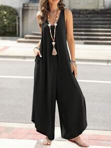 Jumpsuit With Back Straps And Irregular Trousers - Black - View 5