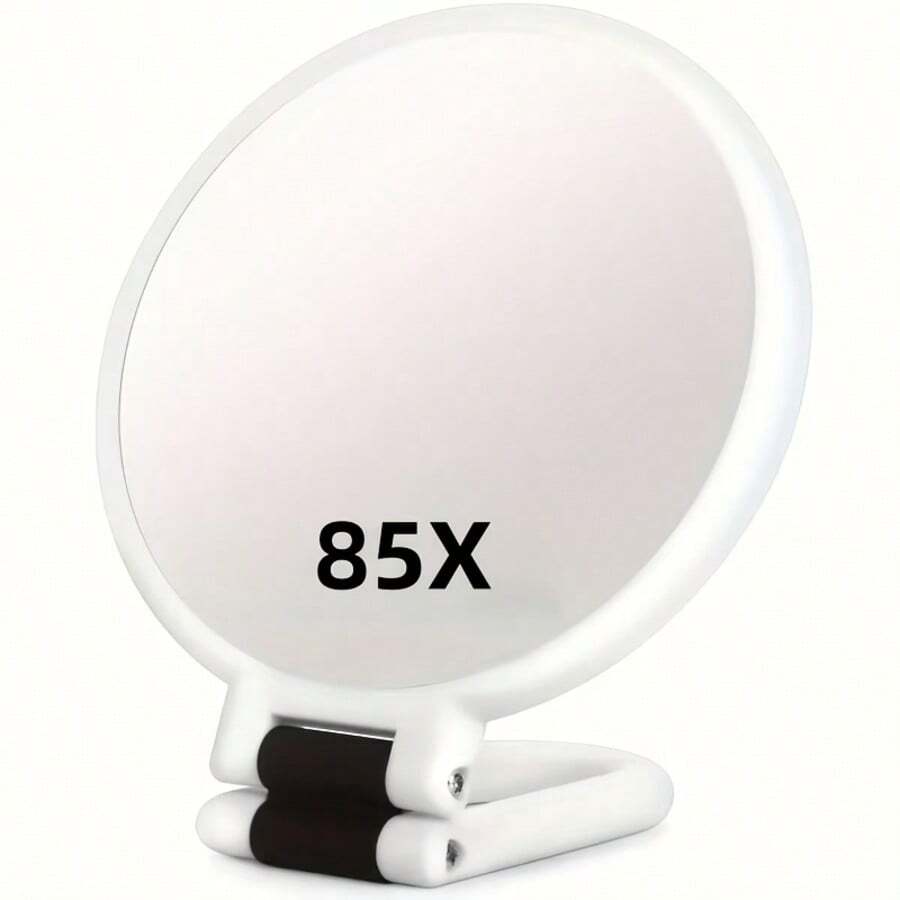 This Is An 85X Handheld Magnifier In White, Offering 1X/80X Magnification. It'S A Compact Travel Mirror For Makeup, Equipped With A 360° Adjustable Handle And A Mirror Surface That Comes With Various Colored Borders. Ideal For Makeup Application - White - View 1