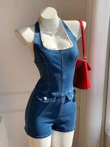 Mono de mezclilla con diseño de botones y escote halter para mujer - Azul lavado medio - Ver 1
