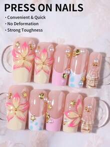 24片长棺材形3D凝胶美甲贴纸，珍珠装饰，按压式贴合，花卉和法式美甲设计，完美贴合指尖。套装包含：1卷双面胶带和1把指甲锉。闪亮美甲贴纸，适合夏季，适合女性日常工作和派对场合。 - 彩色 - 查看 5