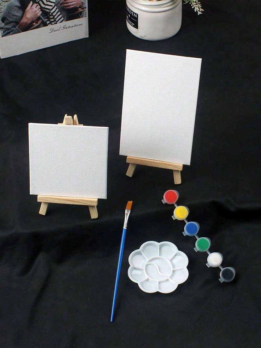 迷你绘画套装，包含调色盘、画笔、画布和画架。适用于油画、丙烯画、水粉画、水彩画等多种颜料。易于上色，不易晕染。可作为圣诞礼物、个人艺术创作、亲子互动、情侣游戏、绘画入门及专业艺术家使用。画架、调色盘和画笔均可重复使用，也适合派对绘画。