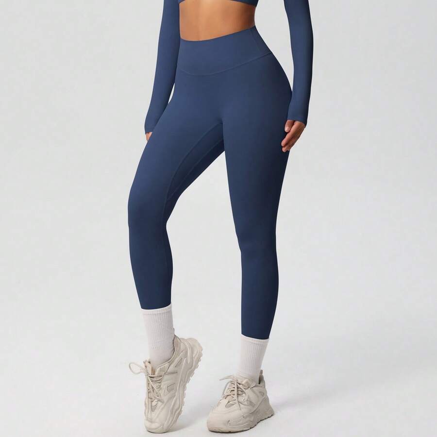 Ensemble de huit pièces pour femmes, comprenant une tenue de yoga respirante, ajustée et brossée double face, de couleur unie, idéale pour le sport, la course et le fitness. - Pantalon 7100 - Badge bleu - Voir 1