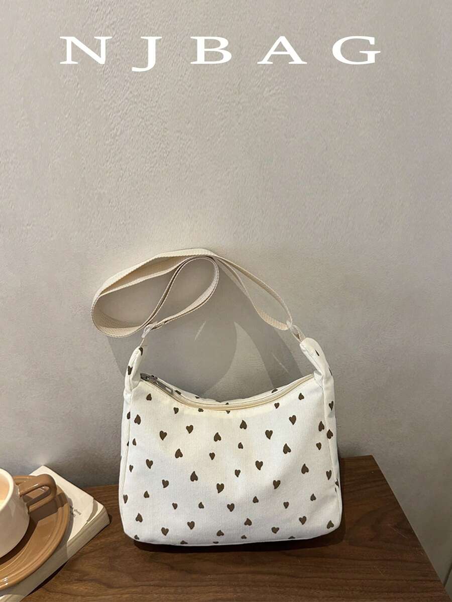 Bolso de hombro minimalista con estampado de corazones en todo el diseño