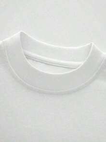 Representando el amor puro por papá las letras D con fresas diminutas y flores blancas sobre fondo rosa y una fresa roja con corazones blancos como la A central esta camiseta de hombre 100% algodón es el regalo perfecto que irradia cari?o paternal - Blanco - Ver 5