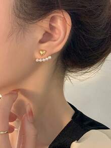 1 Đôi bông tai hình trái tim đính ngọc trai giả - Vàng - Xem 4
