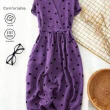 . . Vestido casual elegante y vintage con estampado de lunares, con bolsillos y lazo en la espalda. Silueta minimalista pero refinada de corte evasé con cintura anudada. Vestido versátil de estilo vintage chic para la oficina u ocasiones especiales. Ligero y bohemio con estilo de lunares para primavera/verano y vacaciones. - Morado - Ver 1