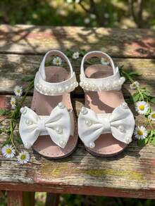 1 Pair 2026 Summer Girls' Soft Sweet Style Flat Sandals, Decorated With Pearl Bows And PU Material, Featuring Hook And Loop Closure And Open Toe Design, Suitable For Daily Wear Or Outdoor Play - Beige - View 6