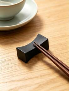 2pcs Solid Color Chopstick Holder Set, Black Plastic & Wood Chopstick Rest, Suitable For Restaurant And Kitchen, Christmas Gift Minimalist Matte Black Ingot-Shaped Chopstick Holder, Universal For Home Hotel Restaurant, Chinese Creative Pillow-Shaped Chopstick Pillow - View 1