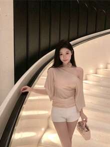 A Summery Women's T-Shirt Adorned With A Luxurious Ribbon Embellished With Diamonds. It Exudes A Sophisticated And Alluring Aura And Is Perfect For Layering. - Pink - View 4