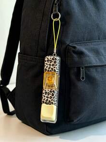 1 pieza Colgante de bolso con estampado de leopardo, un carácter de dopamina, cuatro botones de descompresión de estilo Ins, silencioso y crujiente, para presionar con la yema del dedo - Bolsas - Ver 6
