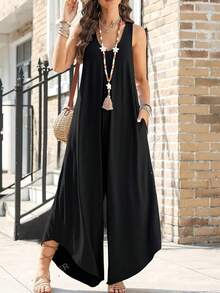 Jumpsuit With Back Straps And Irregular Trousers - Black - View 4
