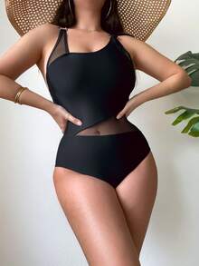 Nuevo traje de baño sexy de una pieza con malla y empalme de color sólido 2448 - Negro - Ver 1
