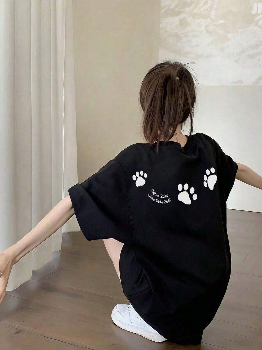 Camiseta de manga corta estilo japonés para mujer, holgada, informal, con cuello redondo, estampado de letras y cachorros, versátil para primavera/verano, negra - alta calidad - Negro - Ver 1